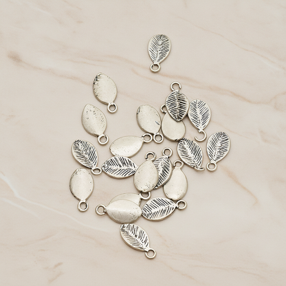 Mini Oval Leaf Pendant, 6 Pc on warm marble background (PD.1208)