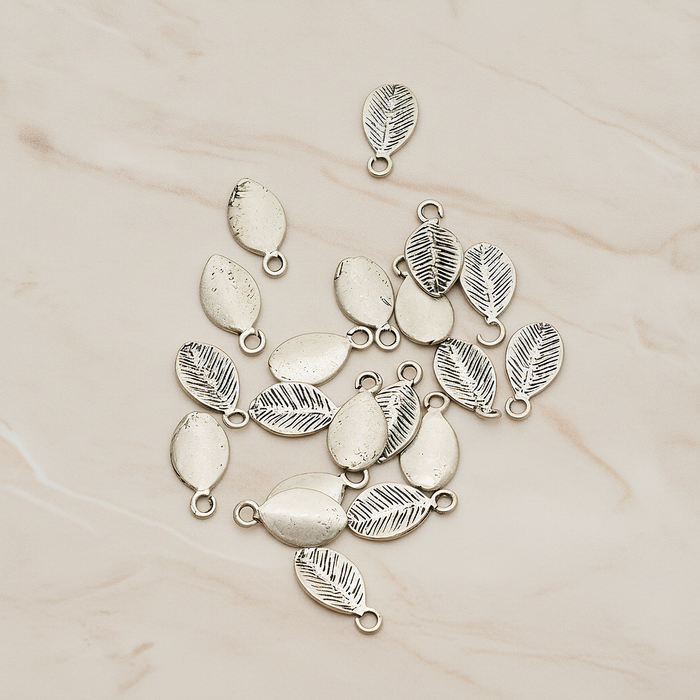 Mini Oval Leaf Pendant, 6 Pc on warm marble background (PD.1208)