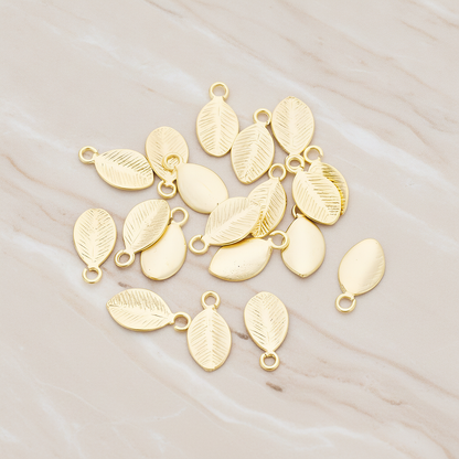 Mini Oval Leaf Pendant, 6 Pc on warm marble background (PD.1208)