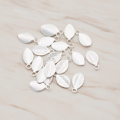 Mini Oval Leaf Pendant, 6 Pc on warm marble background (PD.1208)