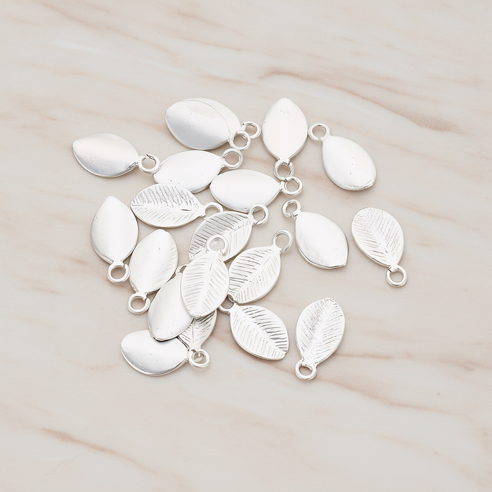Mini Oval Leaf Pendant, 6 Pc on warm marble background (PD.1208)