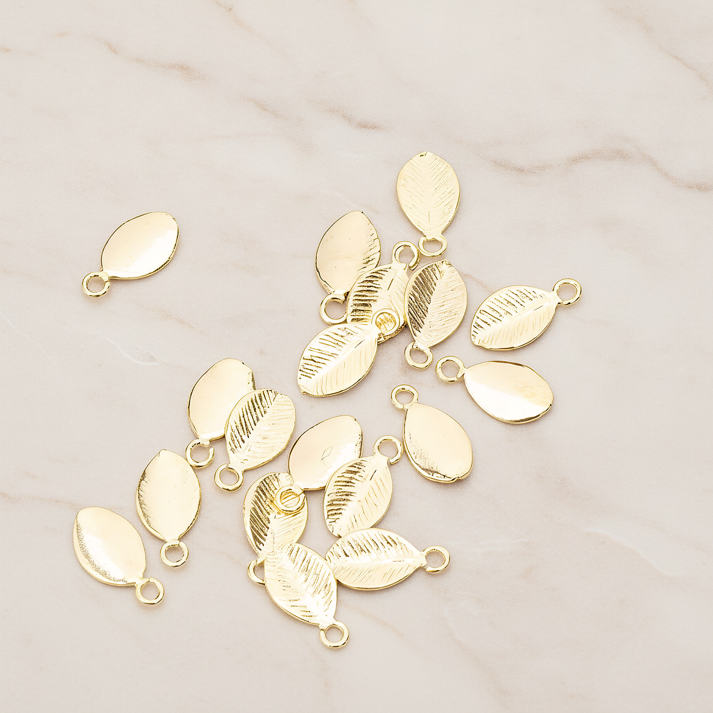 Mini Oval Leaf Pendant, 6 Pc on warm marble background (PD.1208)