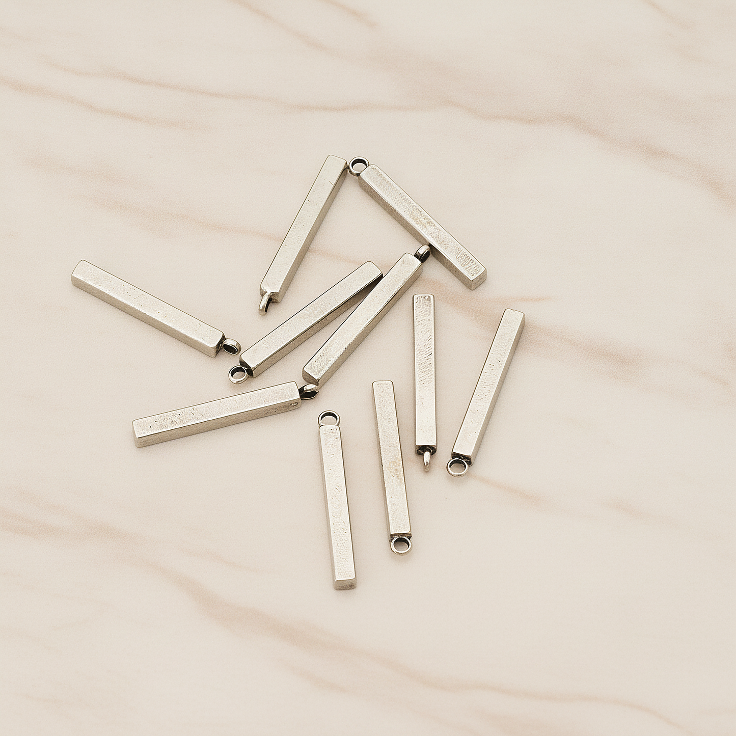 Mini Short Rectangle Bar Pendant, 4 Pc on warm marble background (PD.1228)