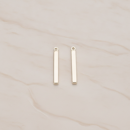 Mini Short Rectangle Bar Pendant, 4 Pc on warm marble background (PD.1228)