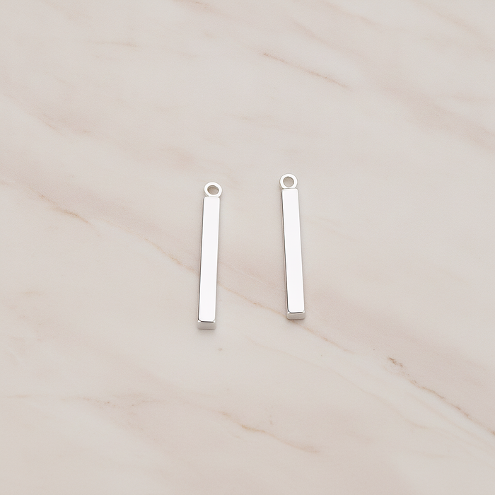 Mini Short Rectangle Bar Pendant, 4 Pc on warm marble background (PD.1228)