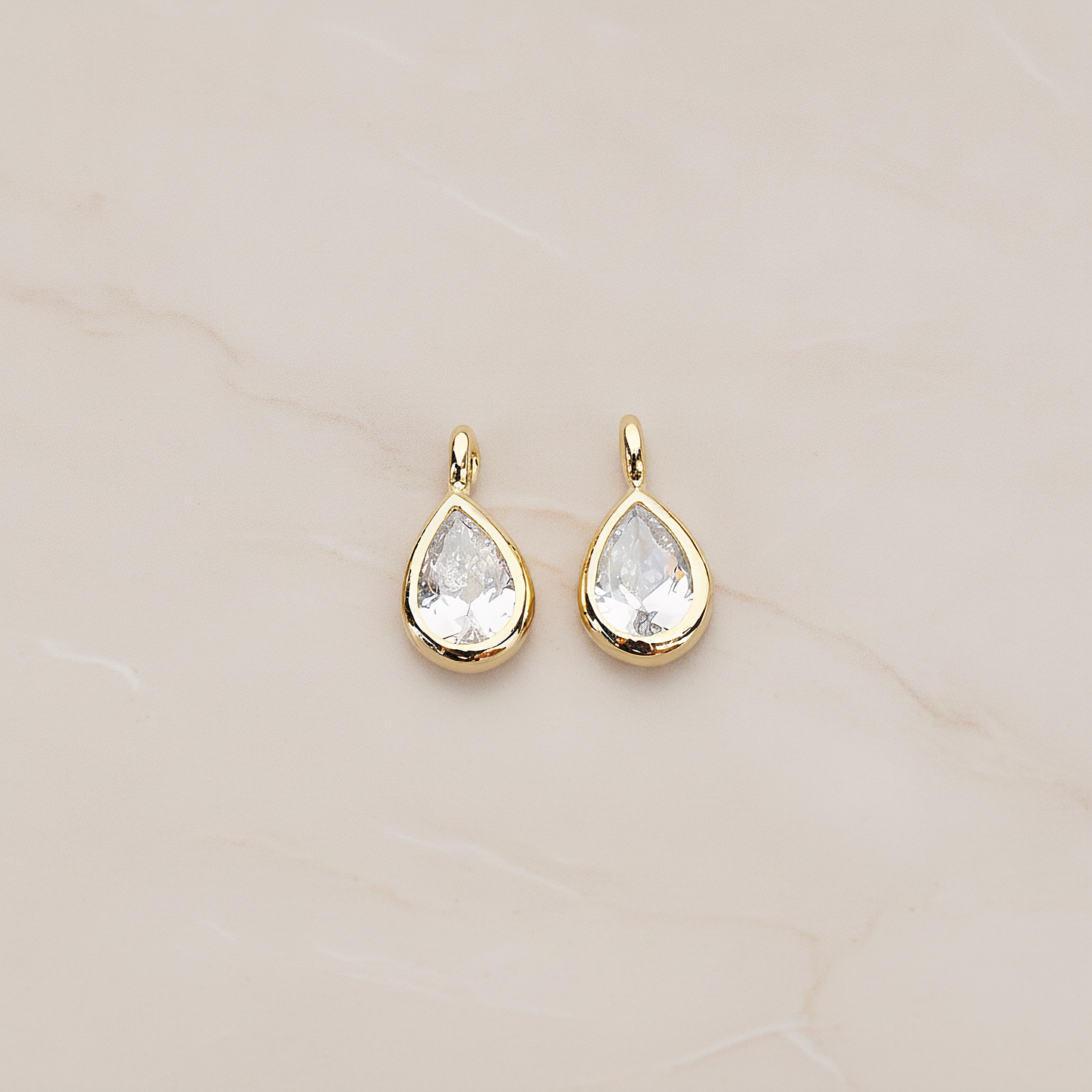Mini Framed Cubic Zirconia Pendant, 2 Pc on warm marble background (PD.1266)