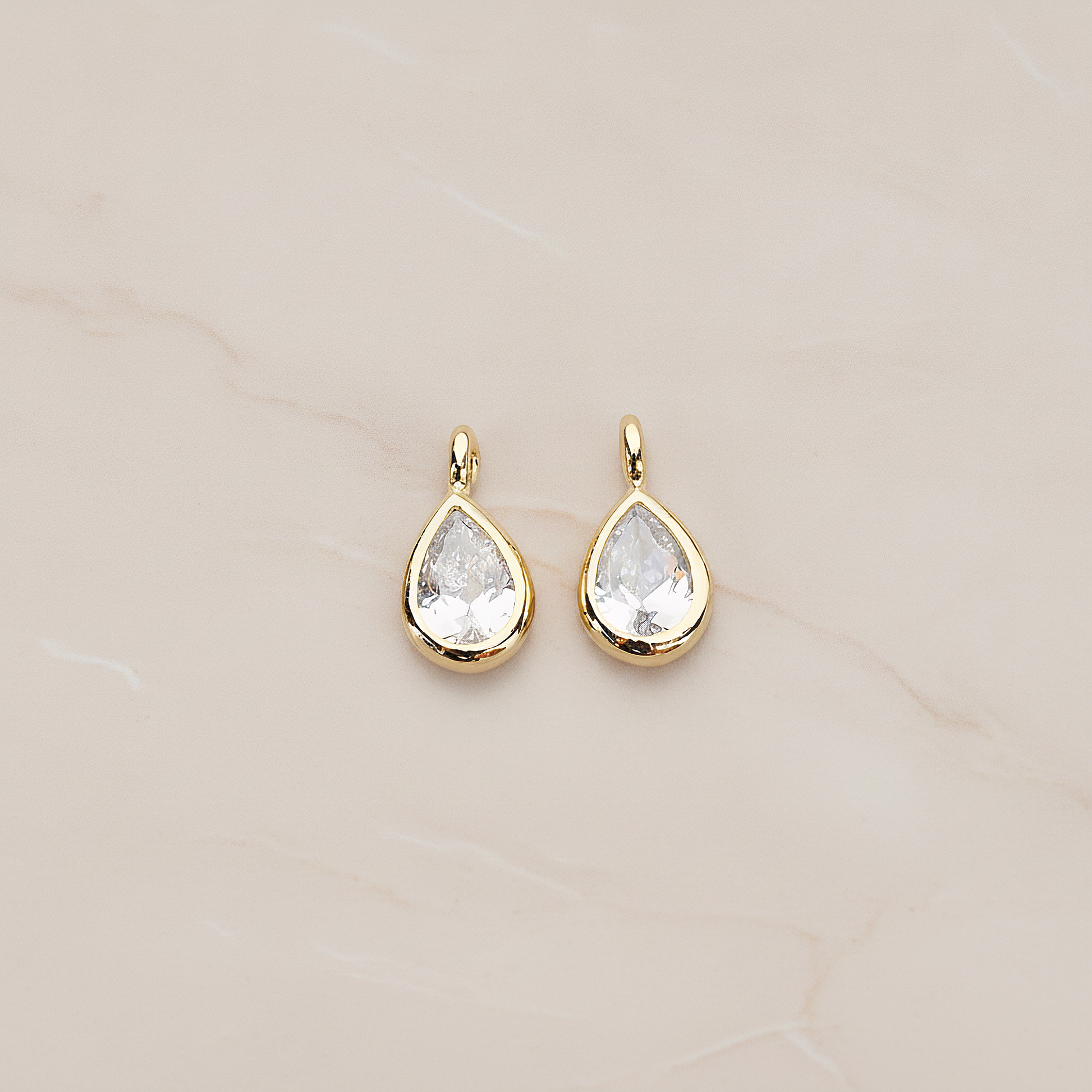Mini Framed Cubic Zirconia Pendant, 2 Pc on warm marble background (PD.1266)
