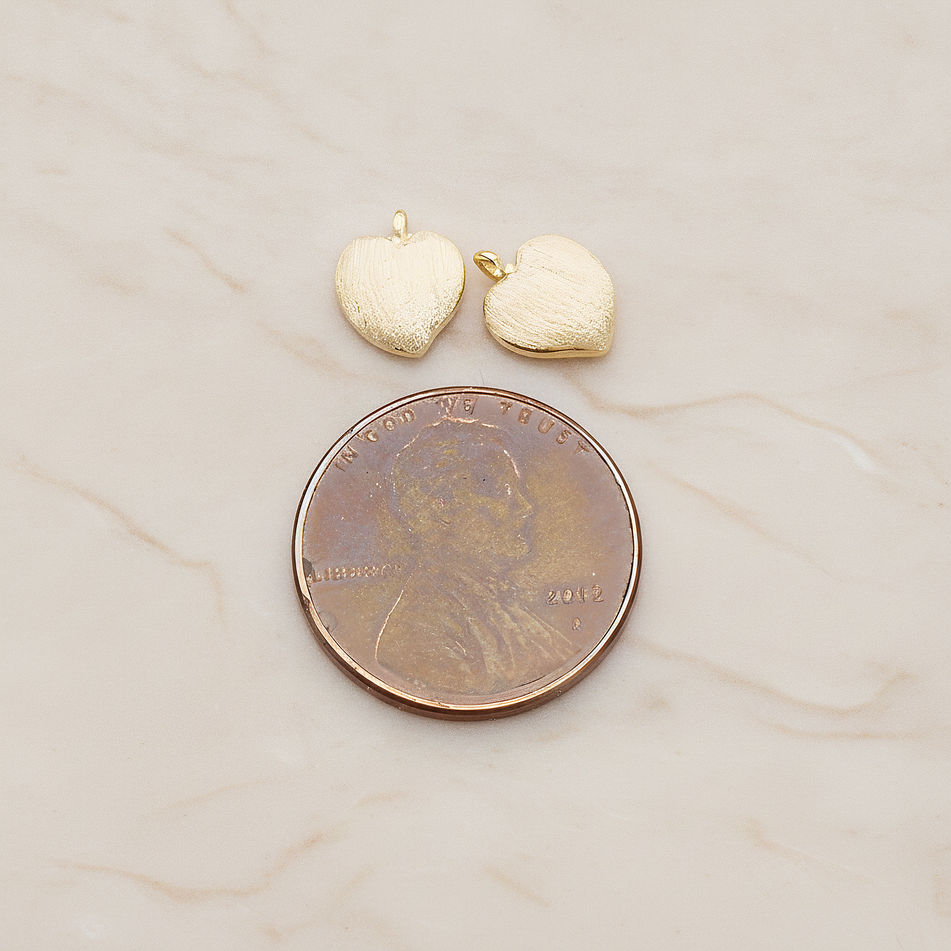 Brushed Cute Apple Shaped Heart Pendant, 2Pc on warm marble background (PD.1296)