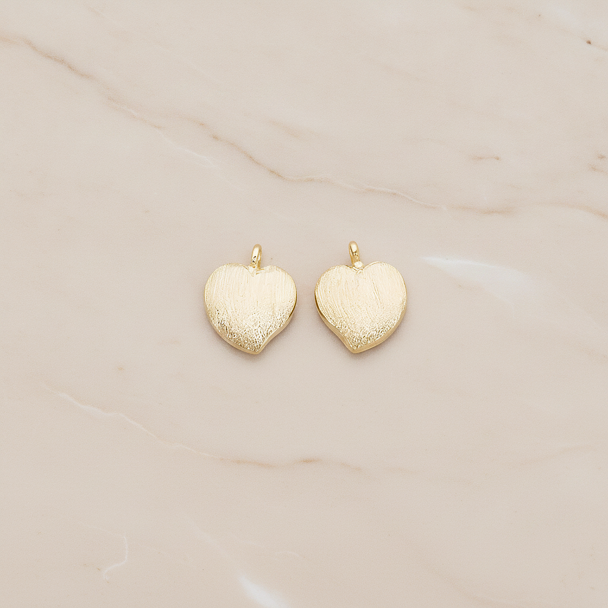 Brushed Cute Apple Shaped Heart Pendant, 2Pc on warm marble background (PD.1296)