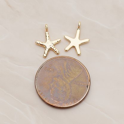 Skinny Starfish Pendant, 2 Pc on warm marble background (PD.1319-01)
