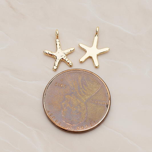 Skinny Starfish Pendant, 2 Pc on warm marble background (PD.1319-01)