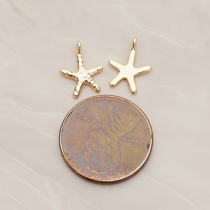 Skinny Starfish Pendant, 2 Pc on warm marble background (PD.1319-01)