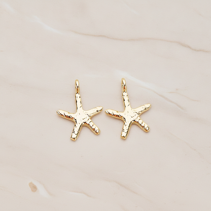 Skinny Starfish Pendant, 2 Pc on warm marble background (PD.1319-01)