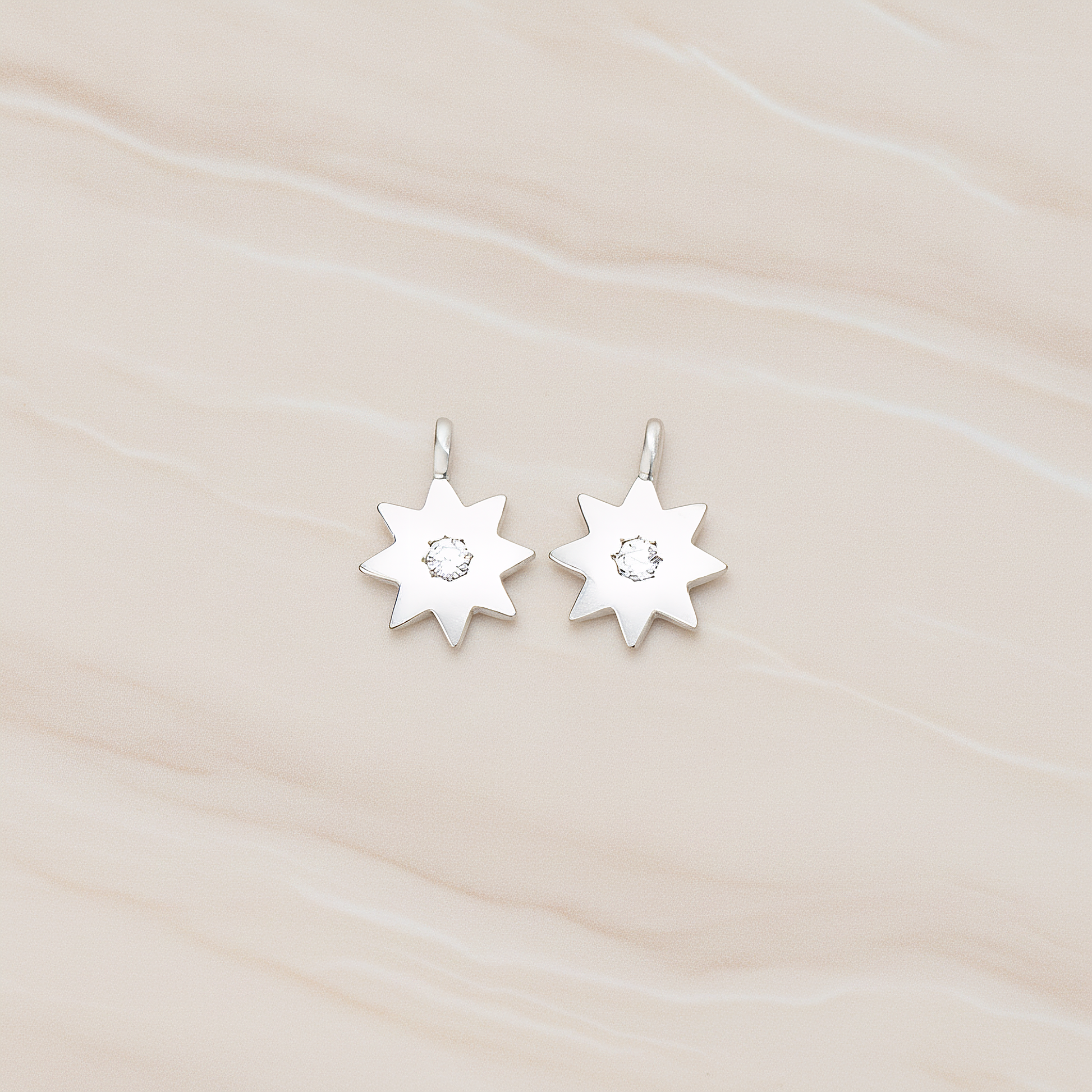 Cubic Center Ancient Sun Pictograph Shape Pendant, 2 Pc on warm marble background (PD.1346)
