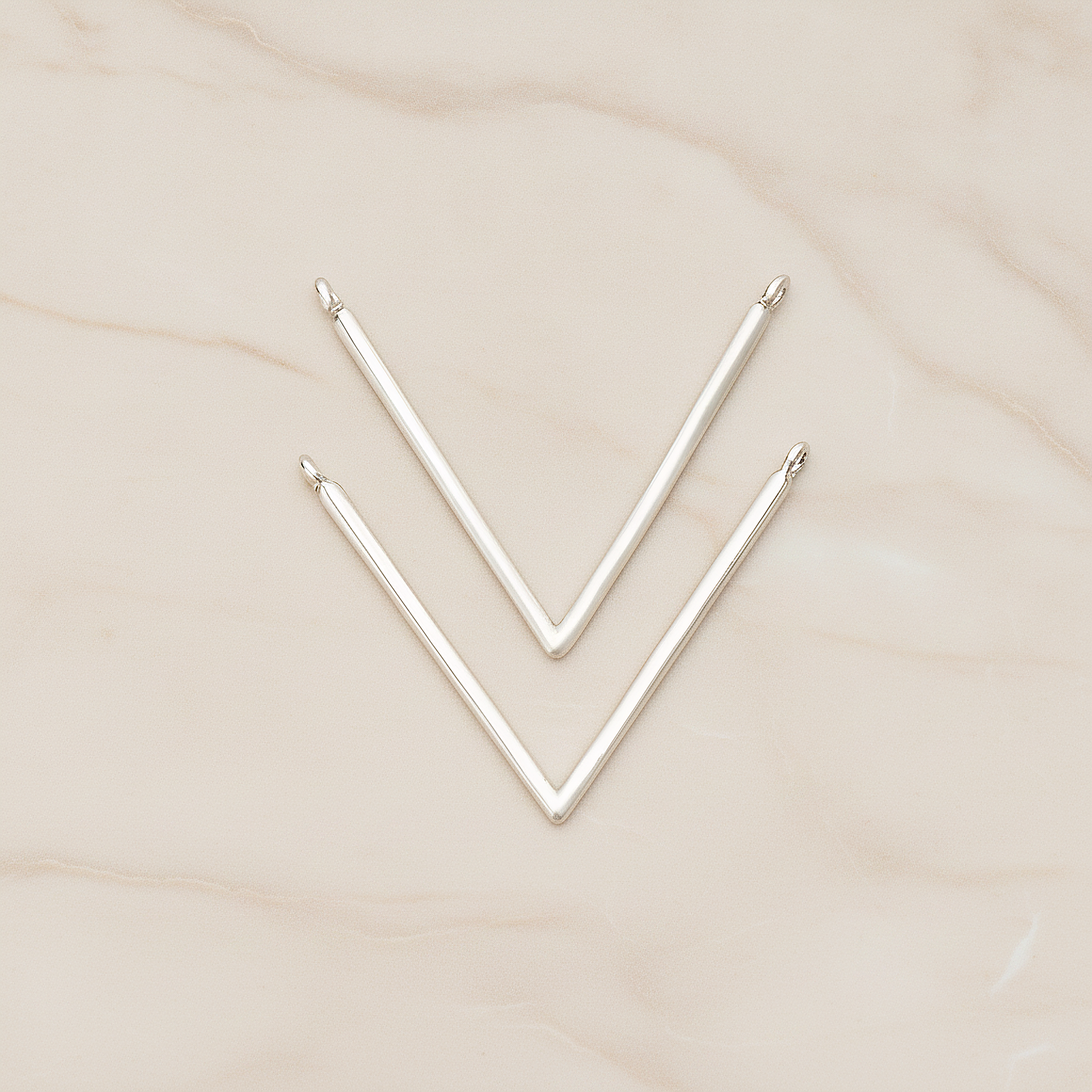 Round Tube V Shaped Pendant, 2 Pc on warm marble background (PD.1359)
