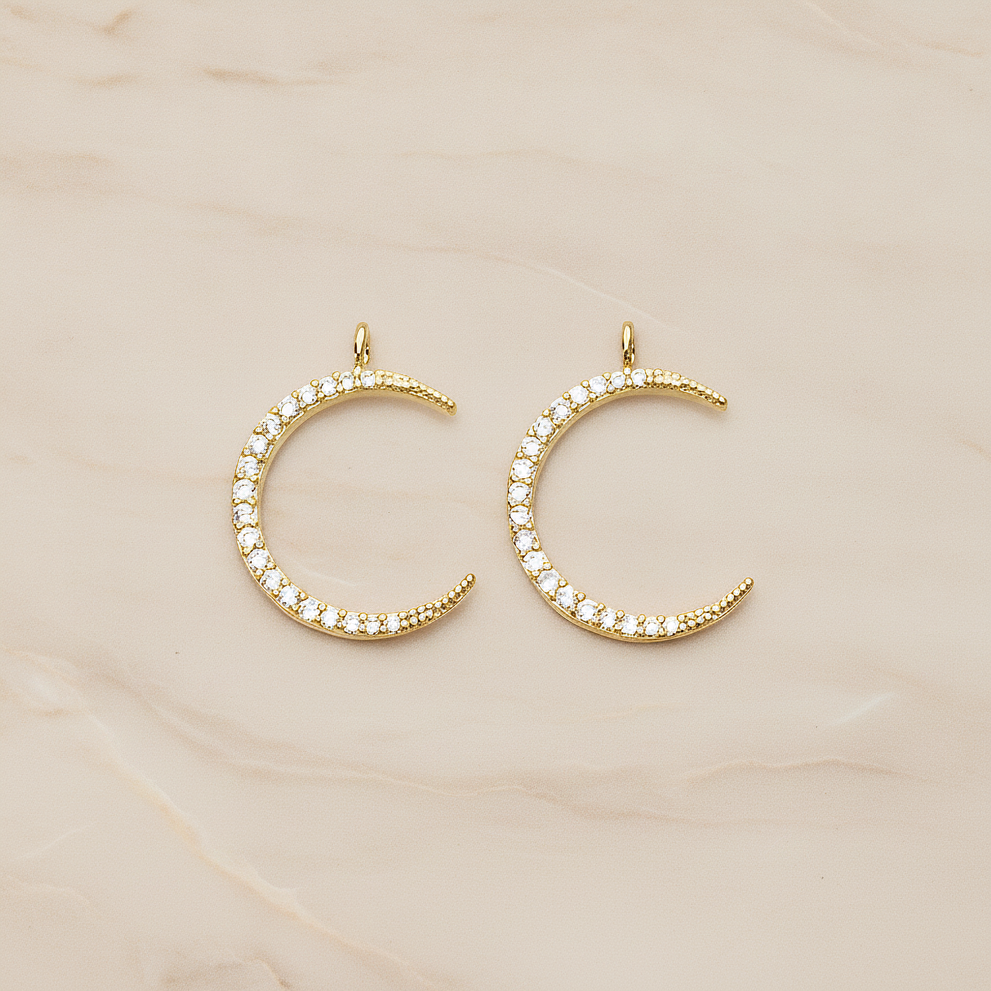 Cubic Zirconia Setting Thin Crescent Moon Pendant, 1 Pc on warm marble background (PD.1365)