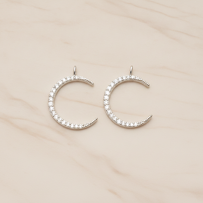 Cubic Zirconia Setting Thin Crescent Moon Pendant, 1 Pc on warm marble background (PD.1365)