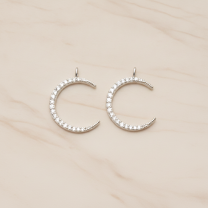 Cubic Zirconia Setting Thin Crescent Moon Pendant, 1 Pc on warm marble background (PD.1365)