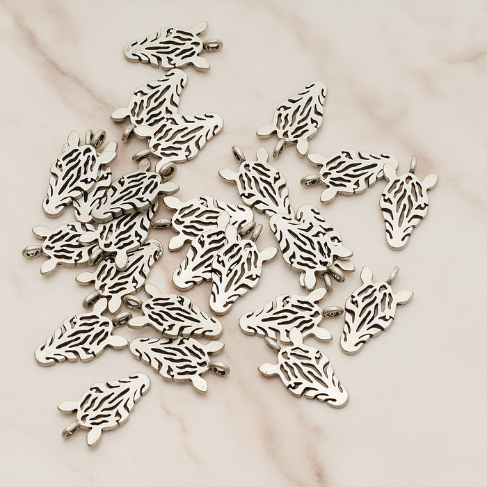 Zebra Mask Pendant, 2 Pc on warm marble background (PD.1370)