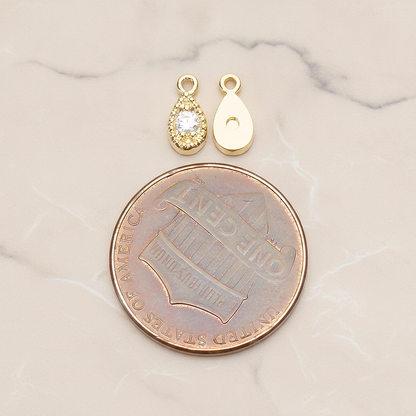 Oval Cubic Setting Textured Frame Mini Teardrop Pendant, 2 Pc on warm marble background (PD.1389)