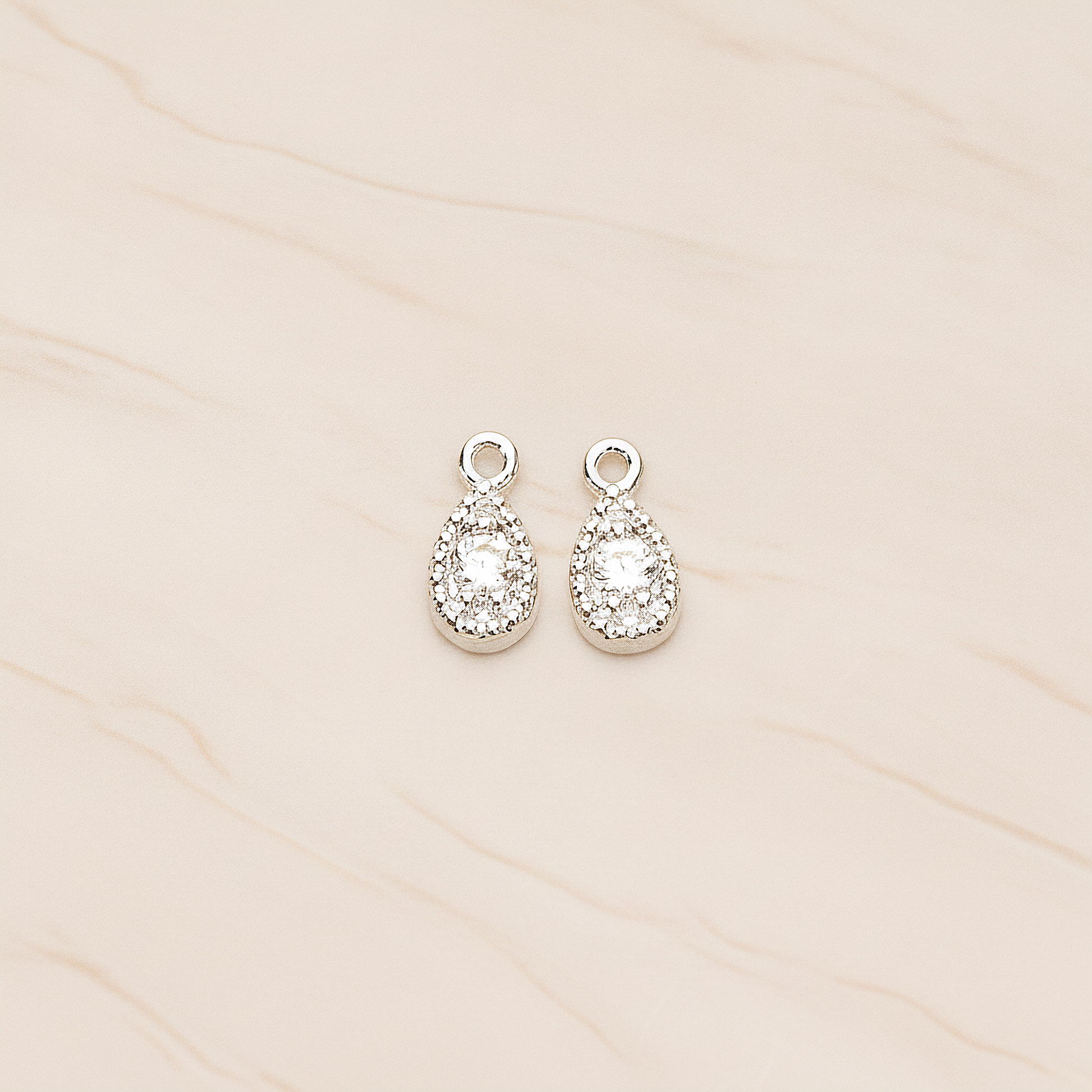 Oval Cubic Setting Textured Frame Mini Teardrop Pendant, 2 Pc on warm marble background (PD.1389)