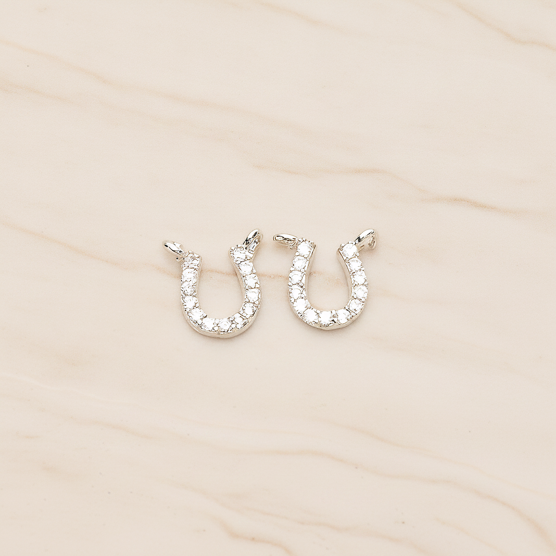 Rhinestones Cubic Zirconia Horse Shoe Double Loops Charm Pendant, 2 Pc on warm marble background (PD.1415)