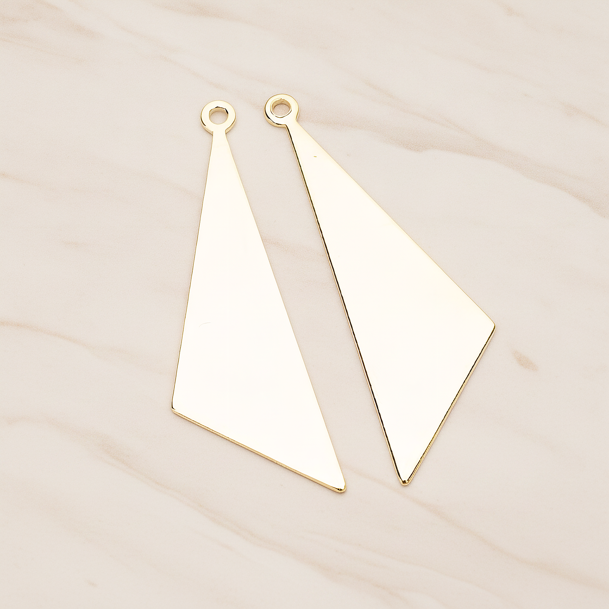 Simple Flat Metal Pad Triangle Pendant, 2 Pc on warm marble background (PD.1419)