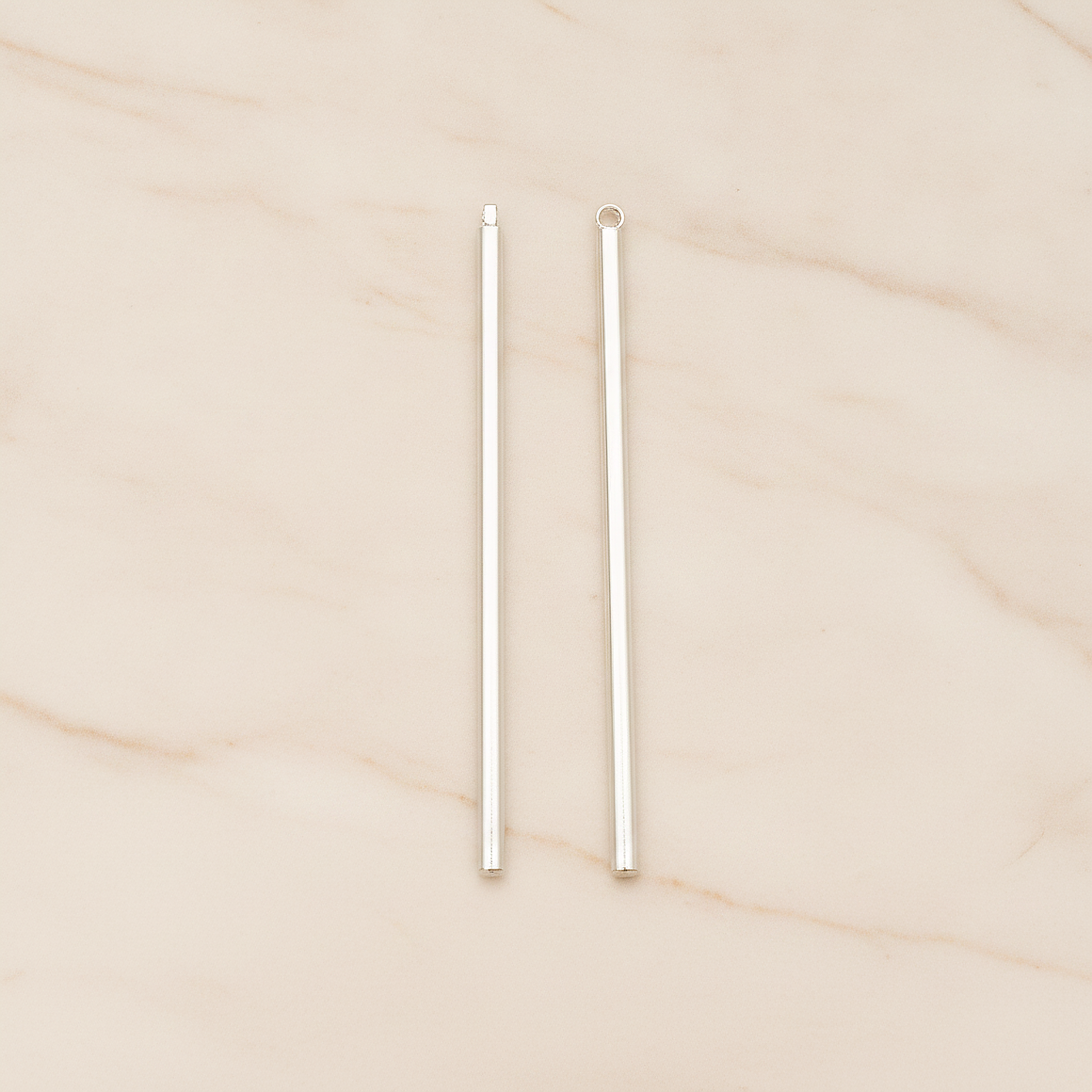 52mm Round Tube Vertical Bar Pendant, 2 Pc on warm marble background (PD.1432-01)