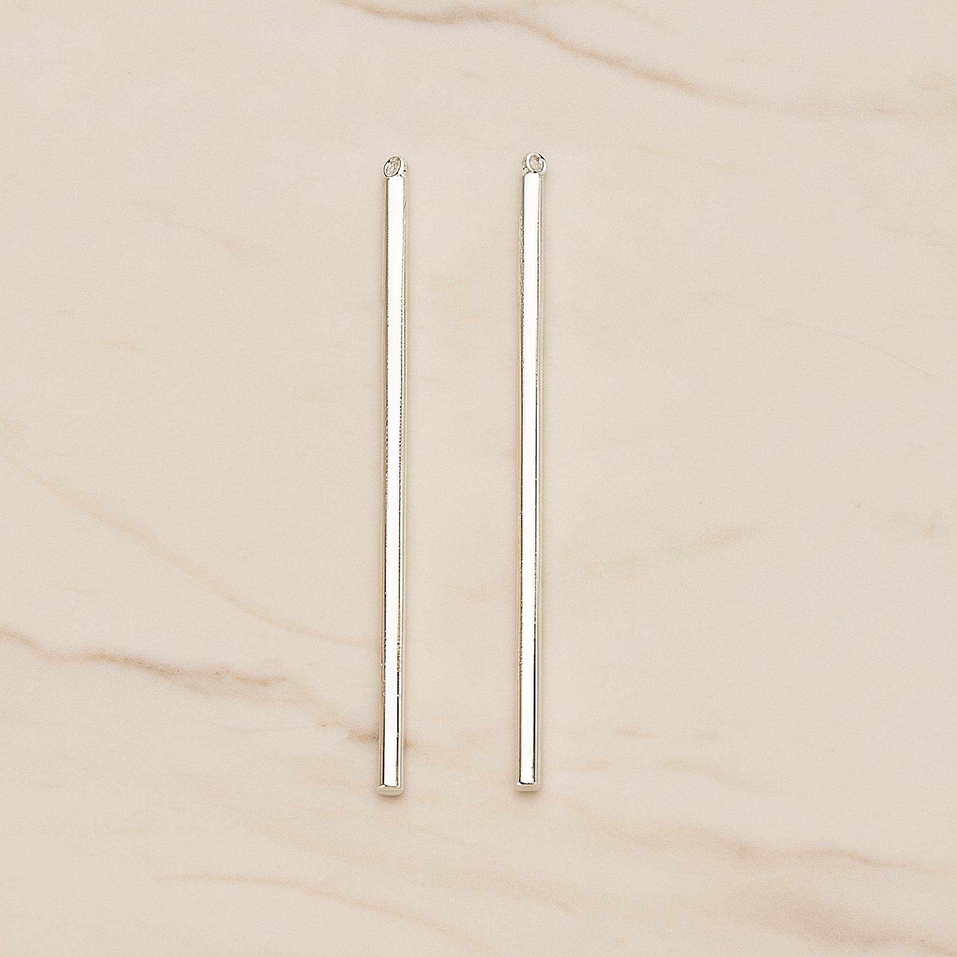 52mm Round Tube Vertical Bar Pendant, 2 Pc on warm marble background (PD.1432-01)