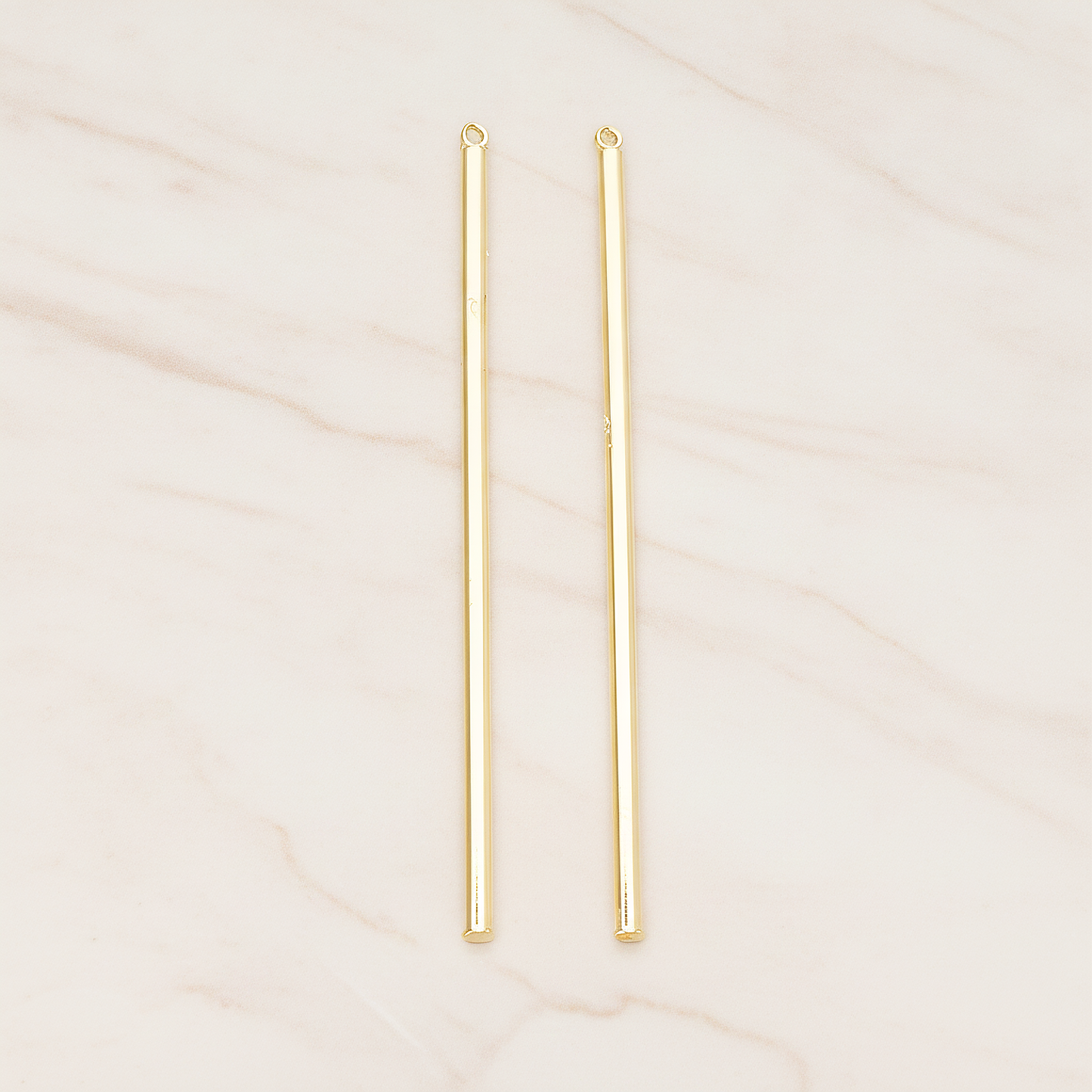62mm Round Tube Vertical Bar Pendant, 2 Pc on warm marble background (PD.1432-02)