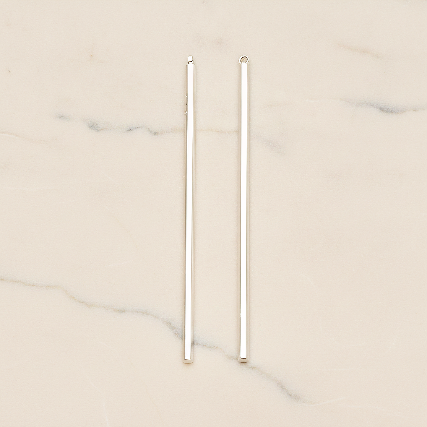 62mm Round Tube Vertical Bar Pendant, 2 Pc on warm marble background (PD.1432-02)
