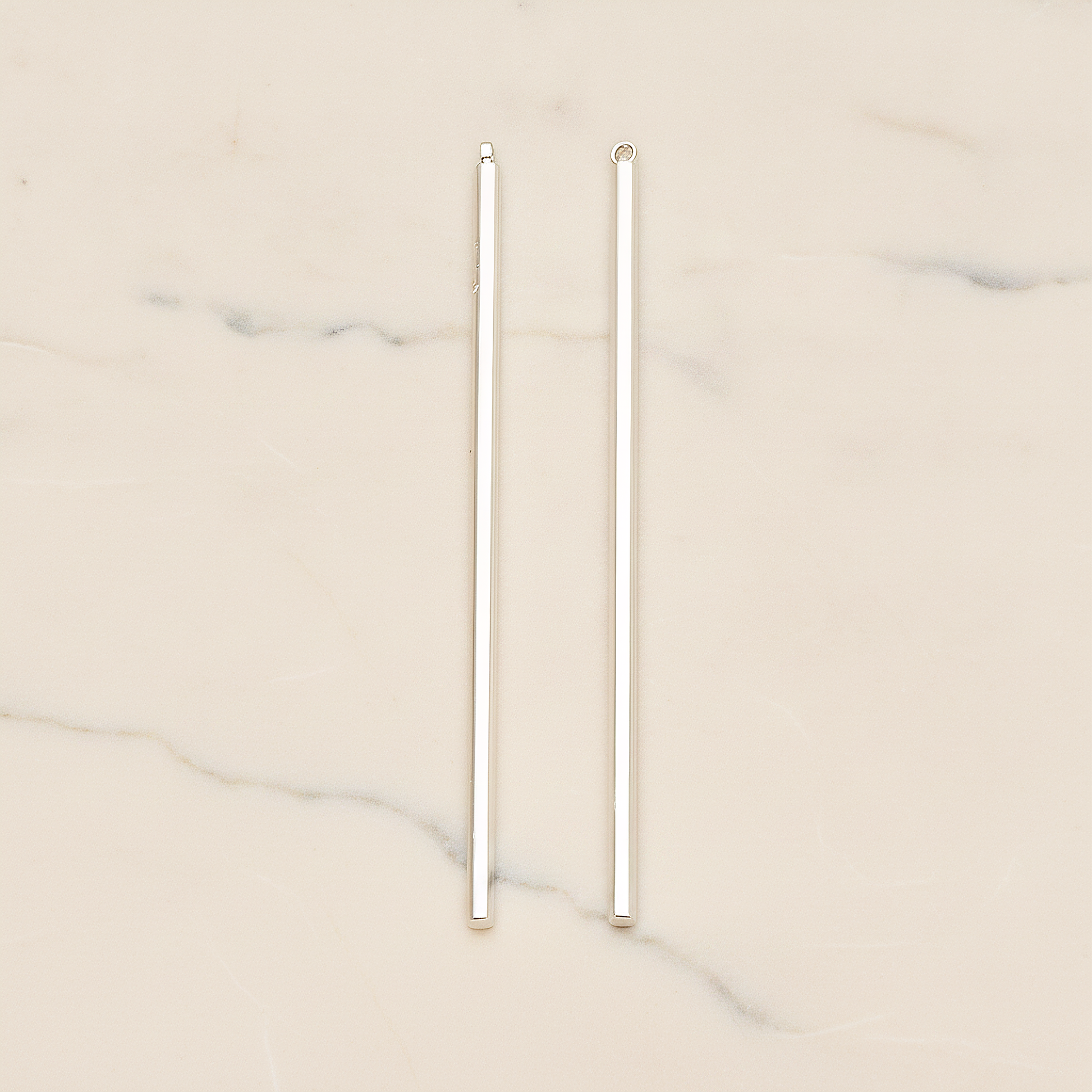 62mm Round Tube Vertical Bar Pendant, 2 Pc on warm marble background (PD.1432-02)