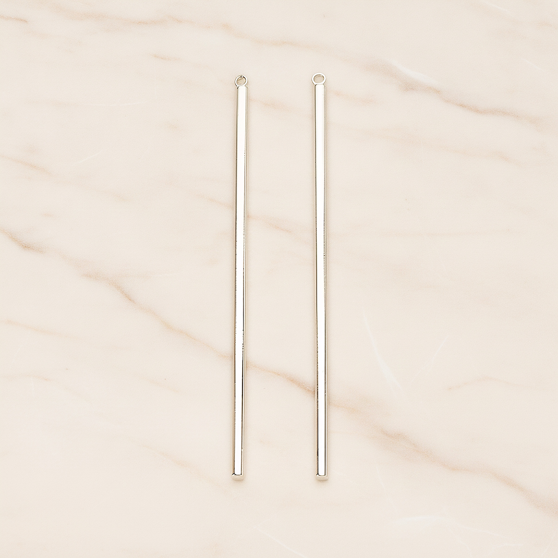 62mm Round Tube Vertical Bar Pendant, 2 Pc on warm marble background (PD.1432-02)