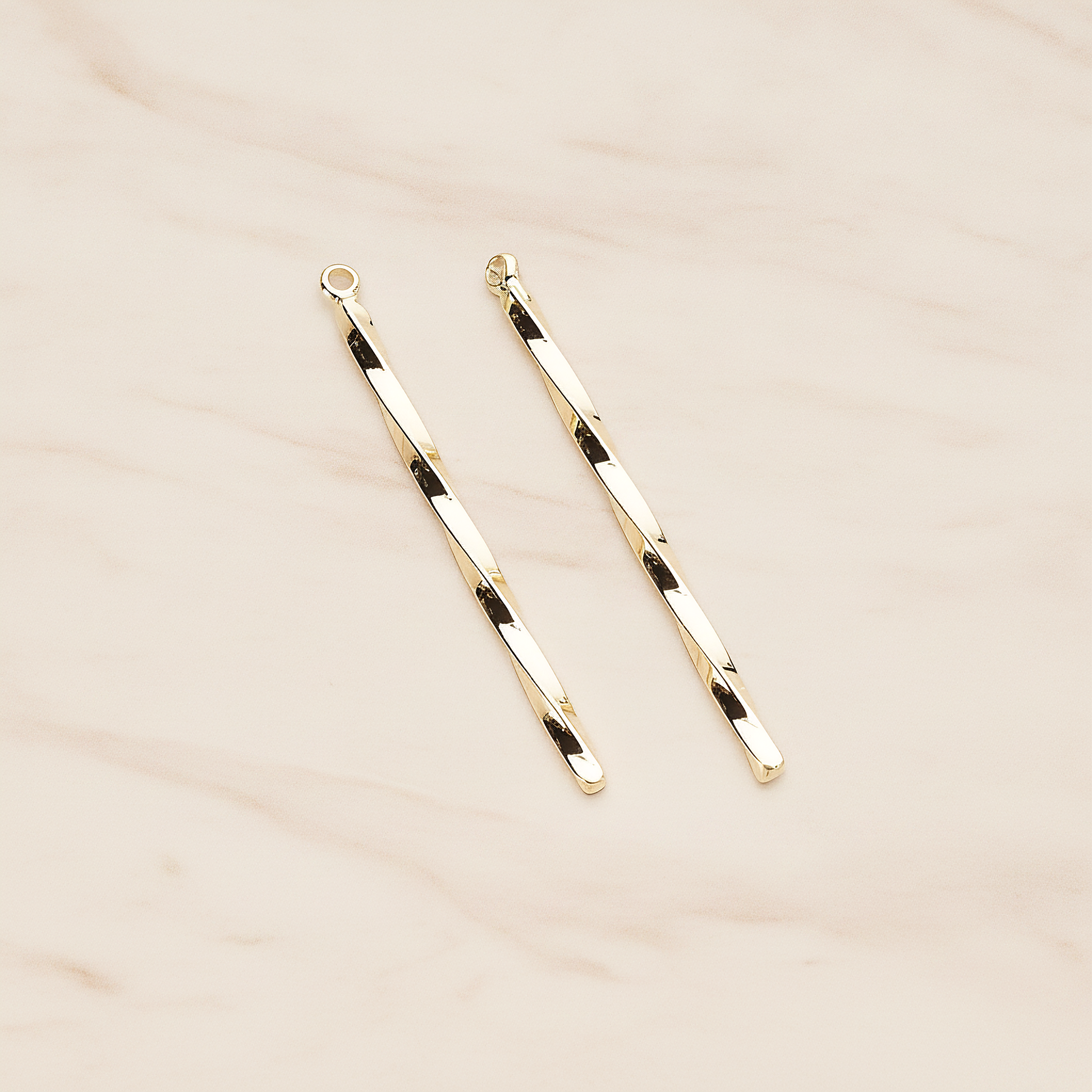 42mm Simple Twisted Vertical Bar Pendant, 2 Pc on warm marble background (PD.1433-01)