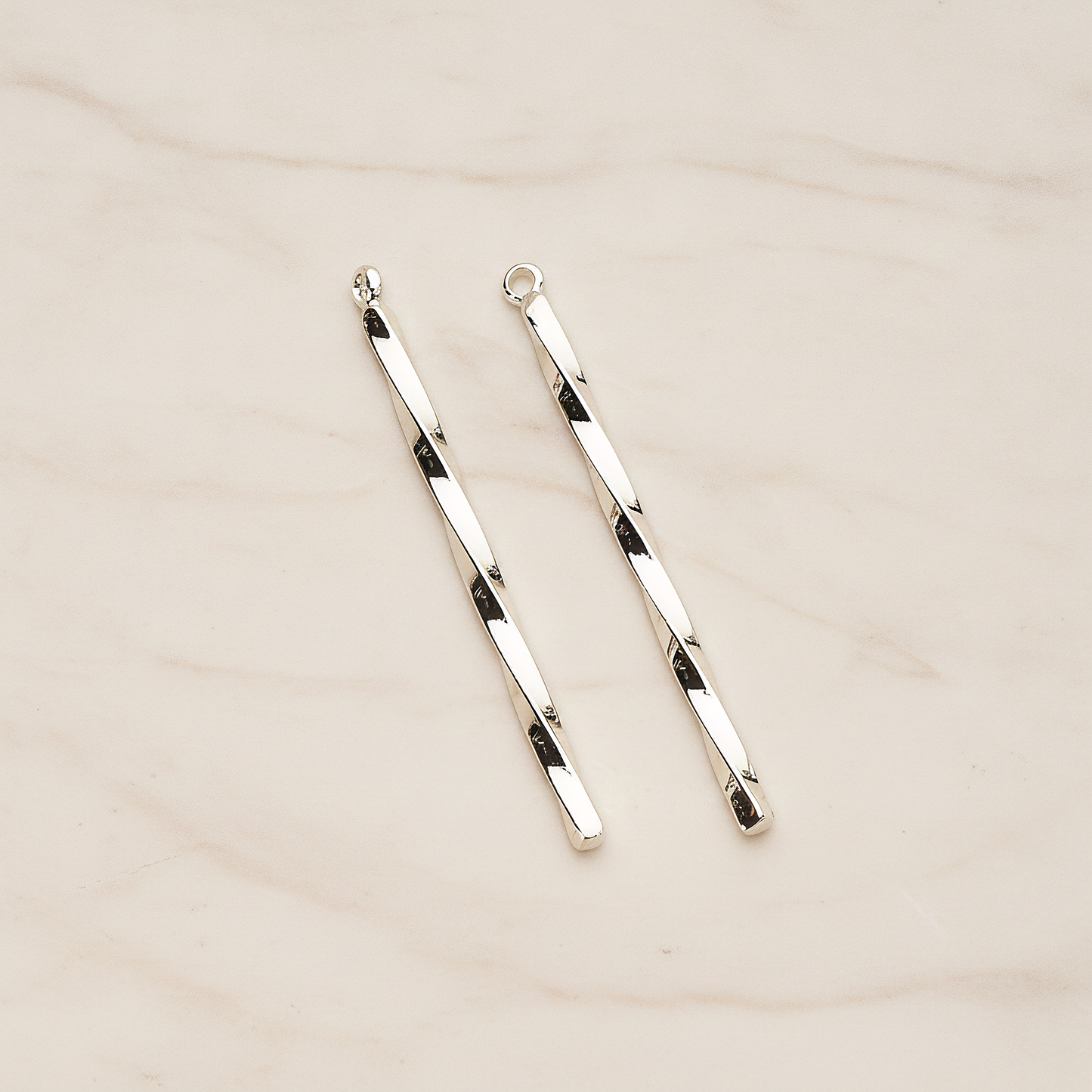 42mm Simple Twisted Vertical Bar Pendant, 2 Pc on warm marble background (PD.1433-01)