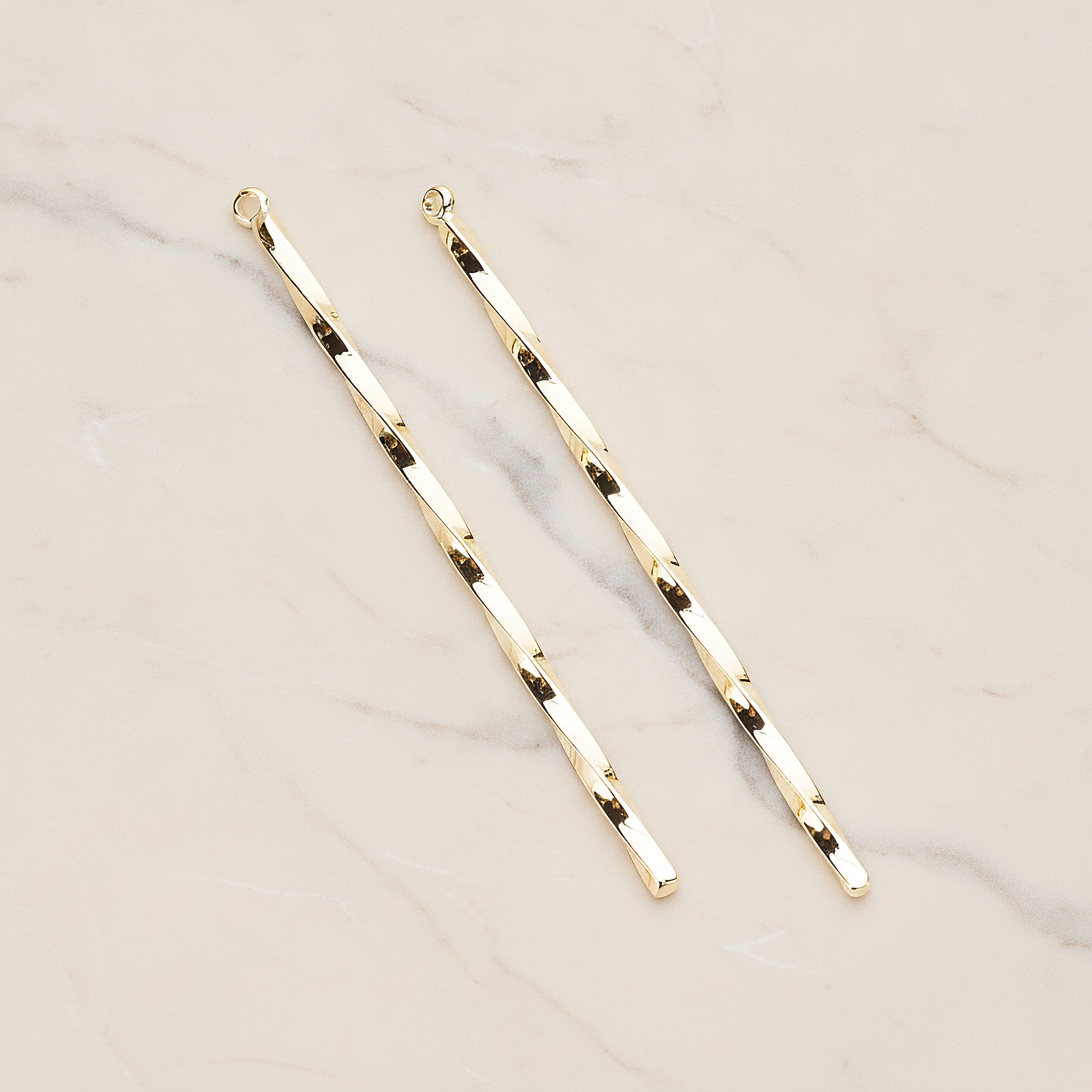 62mm Simple Twisted Vertical Bar Pendant, 2 Pc on warm marble background (PD.1433-02)