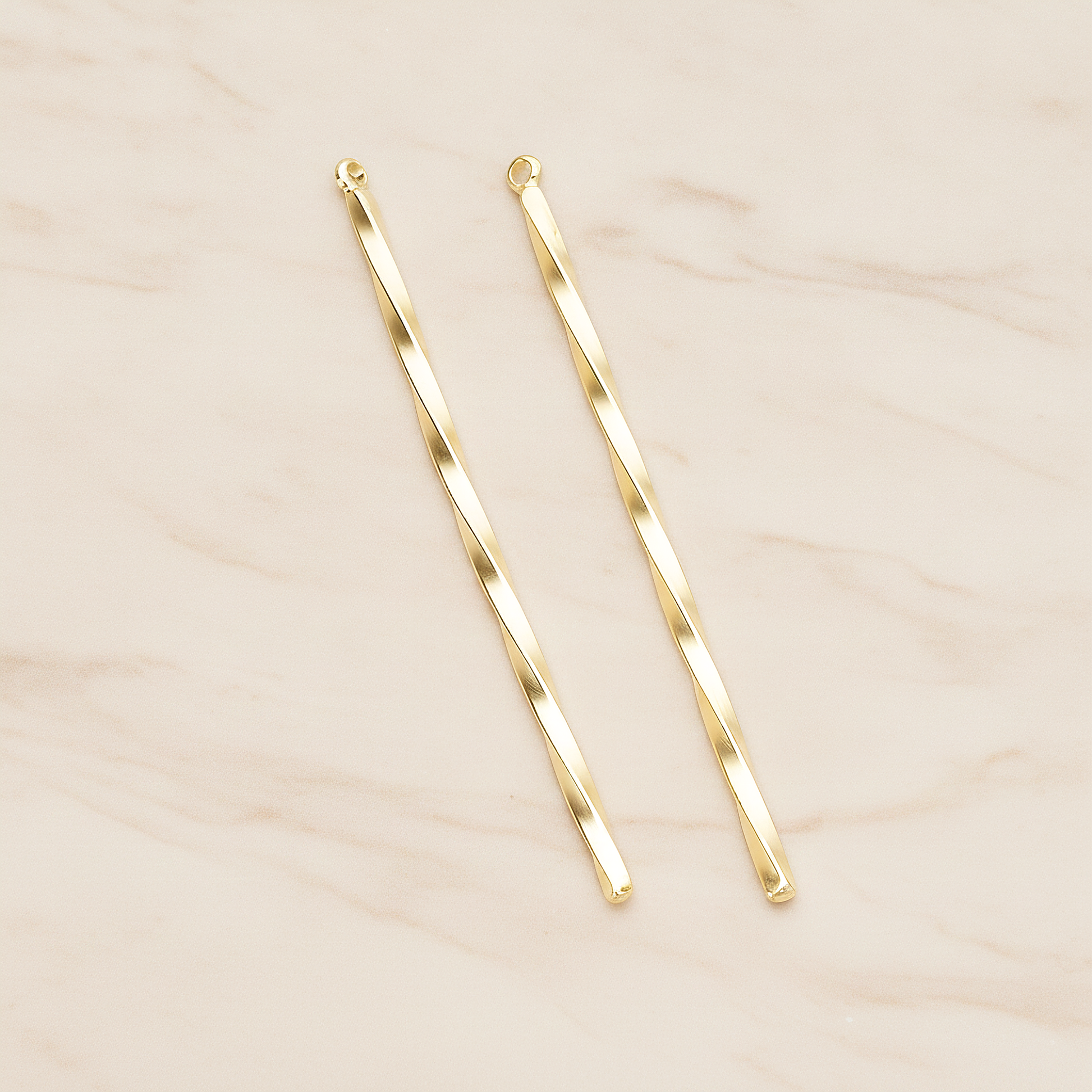 62mm Simple Twisted Vertical Bar Pendant, 2 Pc on warm marble background (PD.1433-02)