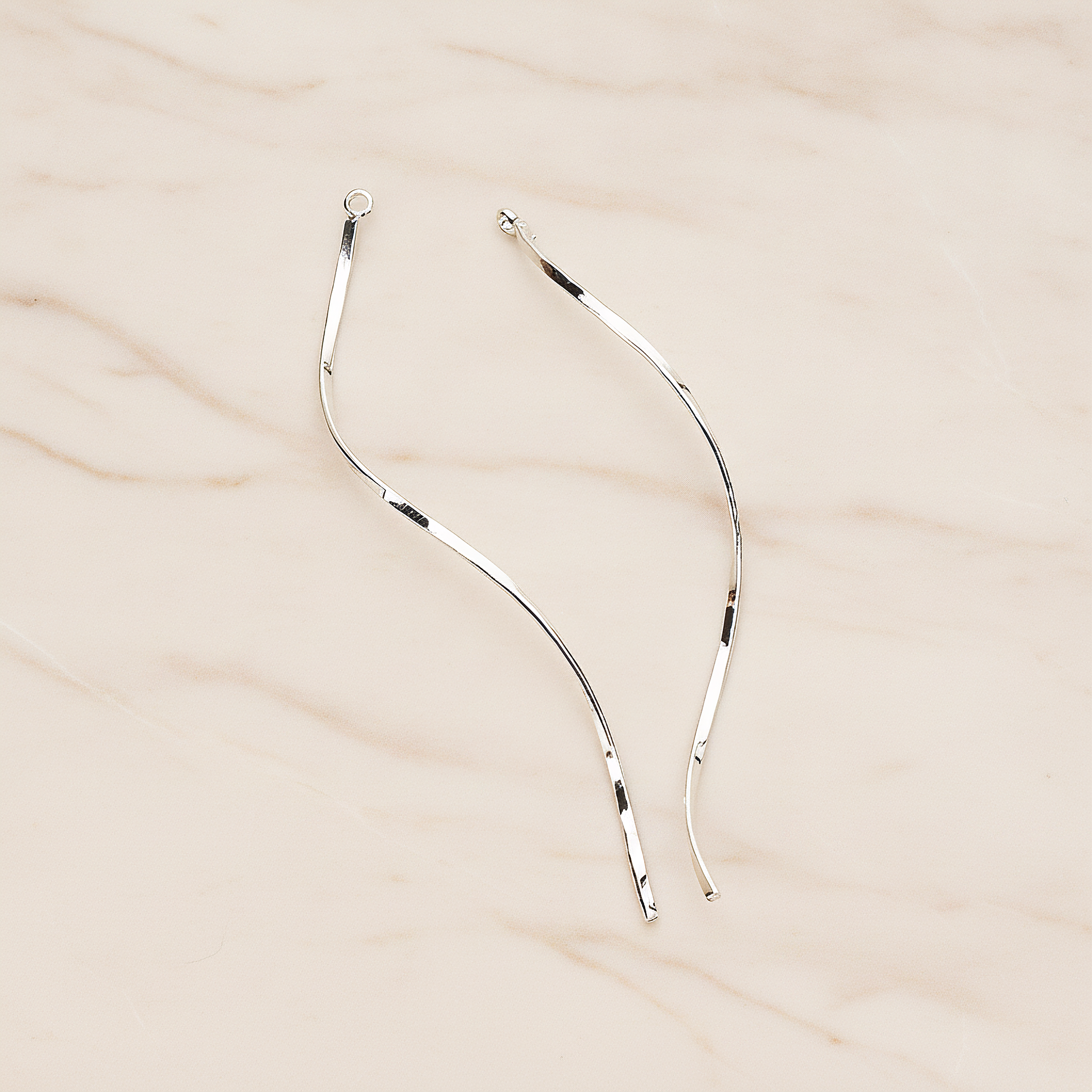 Thin Curvy Twisted Bar Pendant, 2 Pc on warm marble background (PD.1444)
