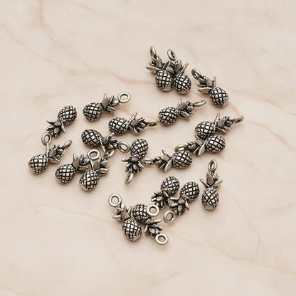 3D Realistic Baby Pineapple Charm Pendant, 2 Pc on warm marble background (PD.1461)