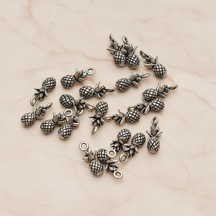 3D Realistic Baby Pineapple Charm Pendant, 2 Pc on warm marble background (PD.1461)