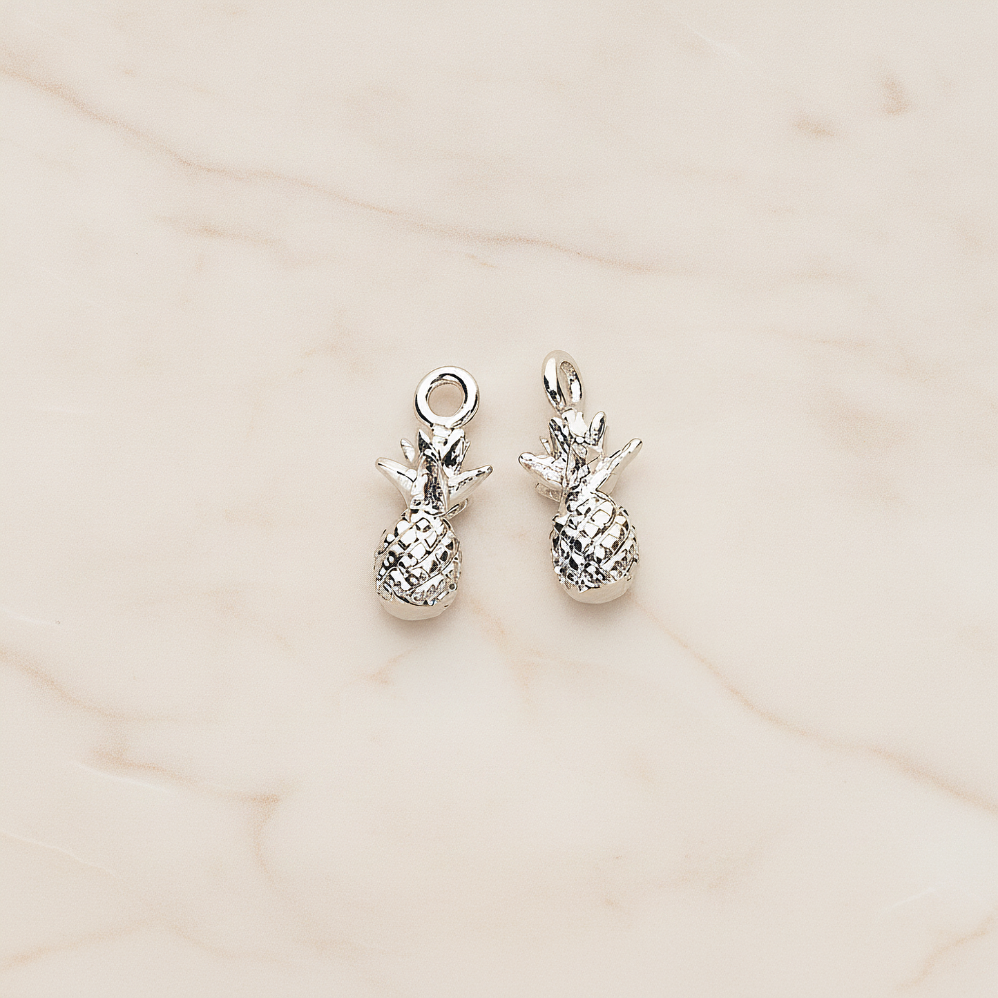 3D Realistic Baby Pineapple Charm Pendant, 2 Pc on warm marble background (PD.1461)