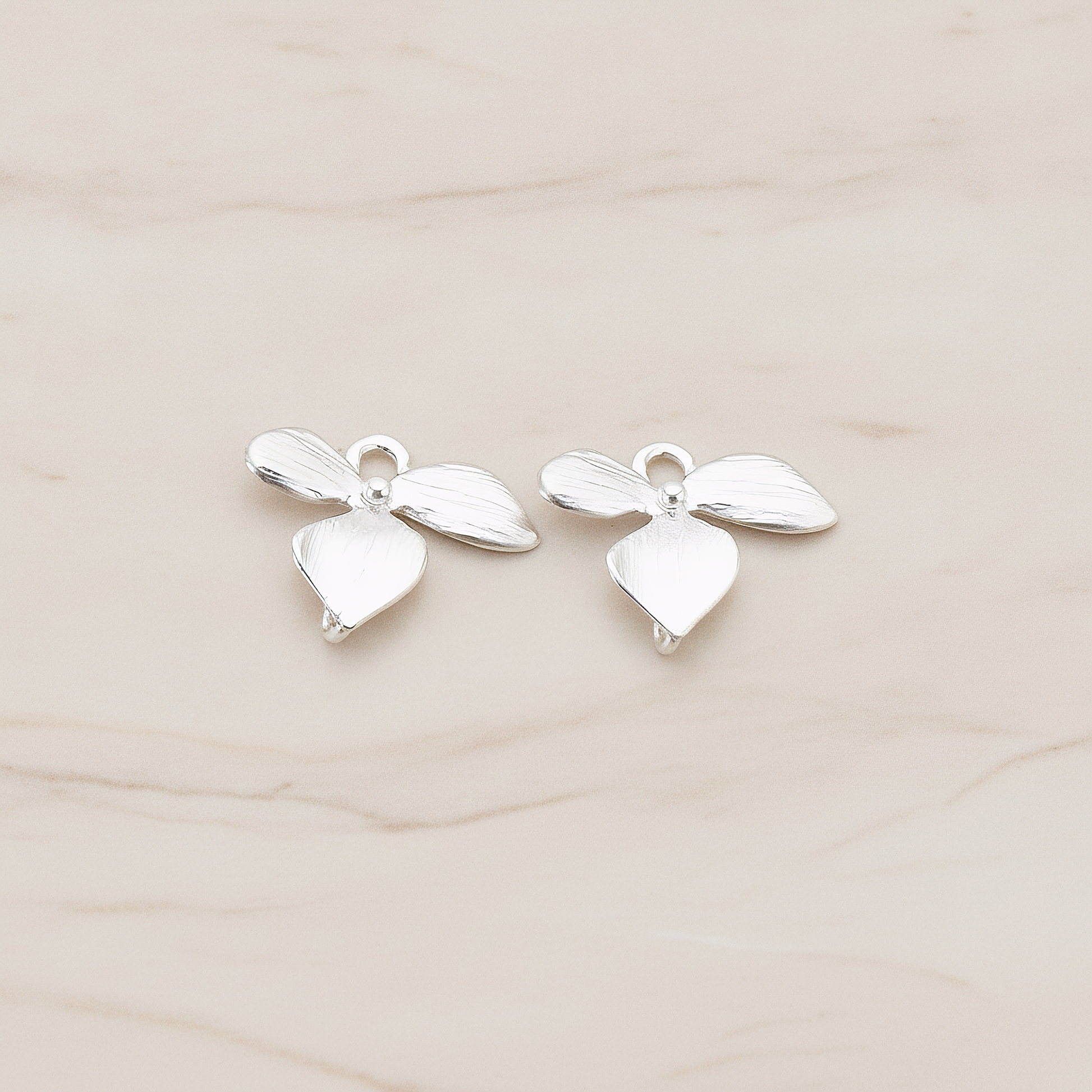 XSMALL Piece Quadruple Flower Pendant, 2 Pc on warm marble background (PD.148-04)