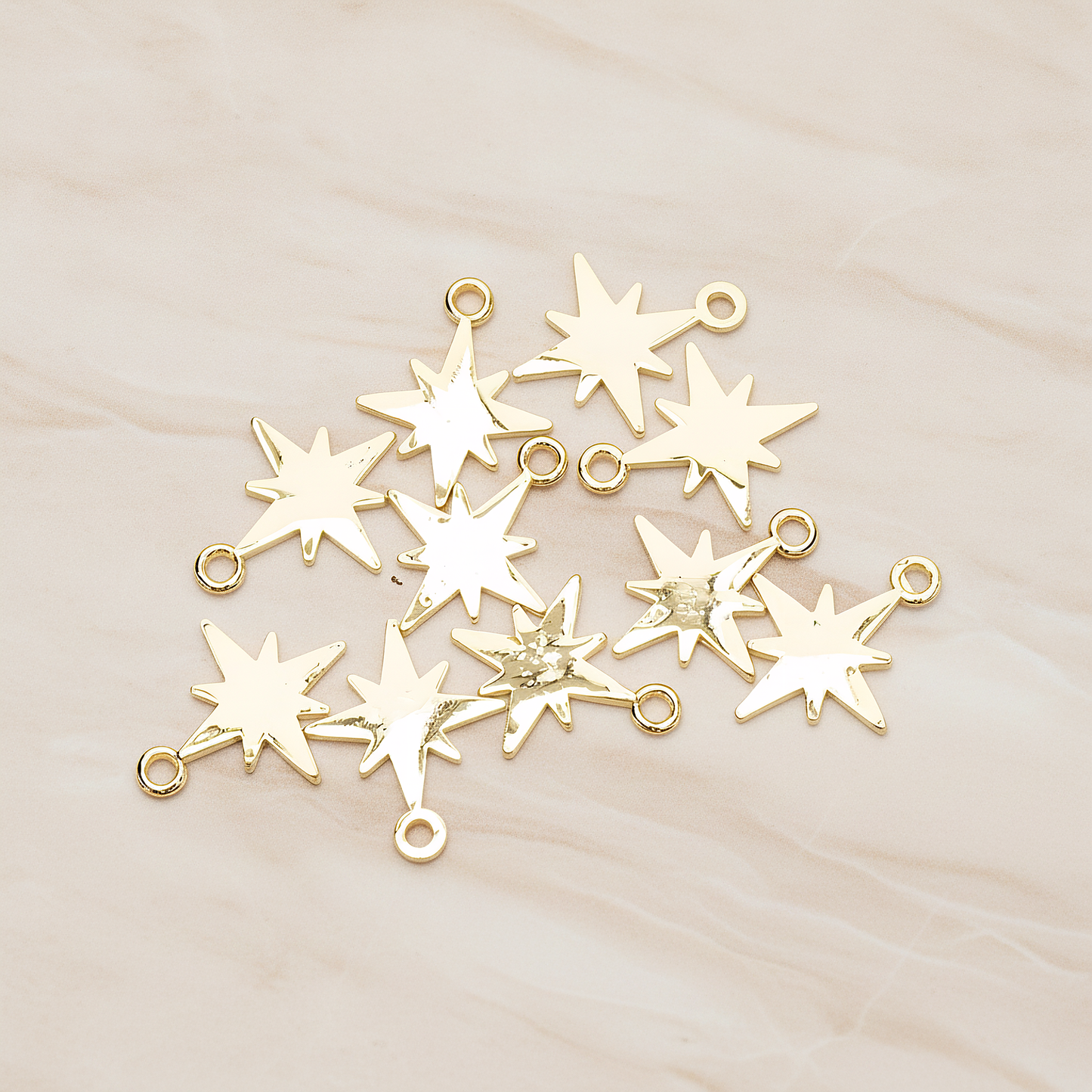 Simple Bright Shinny Star Charm Pendant, 2 Pc on warm marble background (PD.1480)