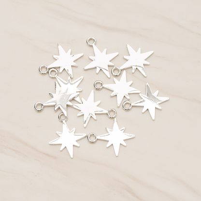 Simple Bright Shinny Star Charm Pendant, 2 Pc on warm marble background (PD.1480)