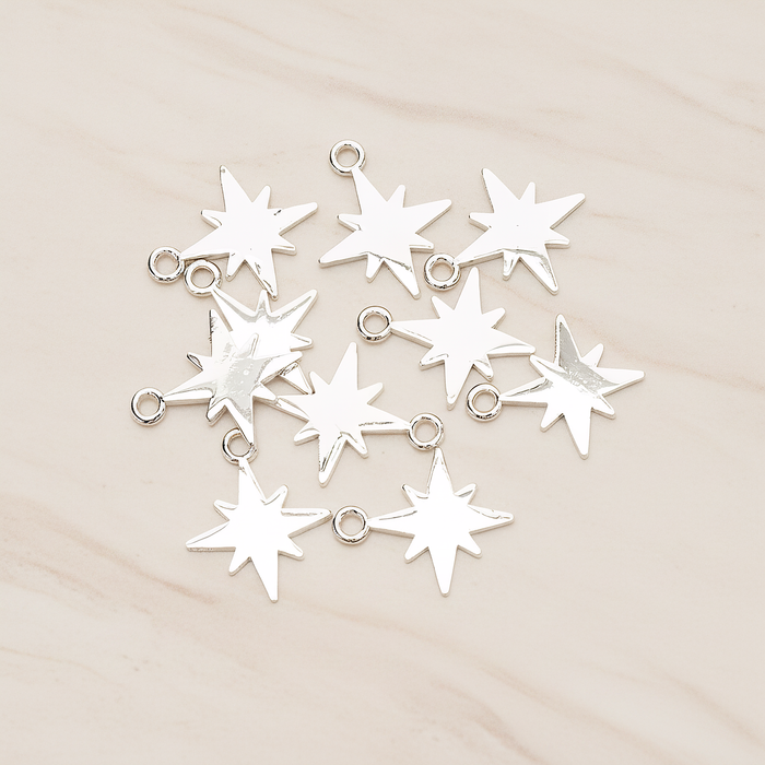 Simple Bright Shinny Star Charm Pendant, 2 Pc on warm marble background (PD.1480)