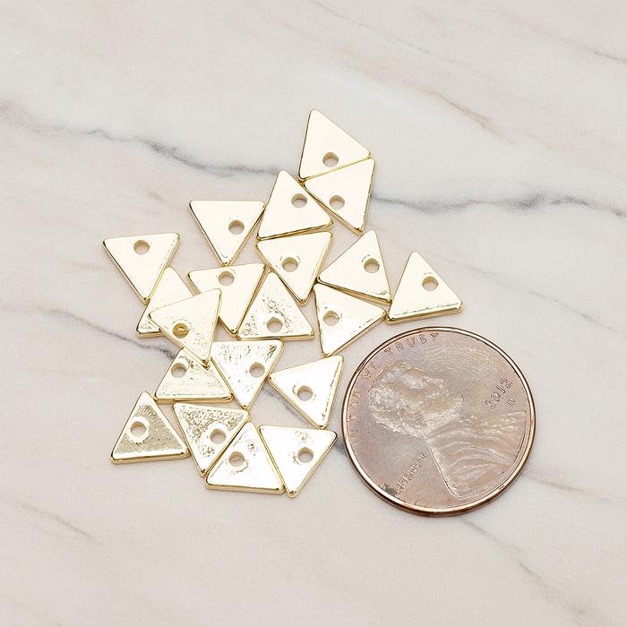 Simple Geometric 7 Mm Triangle Charm Pendant, 4 Pc on warm marble background (PD.1485)