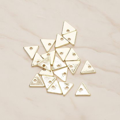 Simple Geometric 7 Mm Triangle Charm Pendant, 4 Pc on warm marble background (PD.1485)