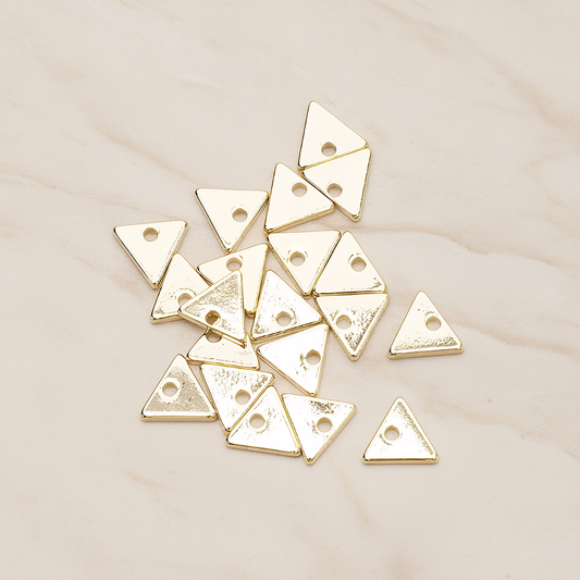 Simple Geometric 7 Mm Triangle Charm Pendant, 4 Pc on warm marble background (PD.1485)