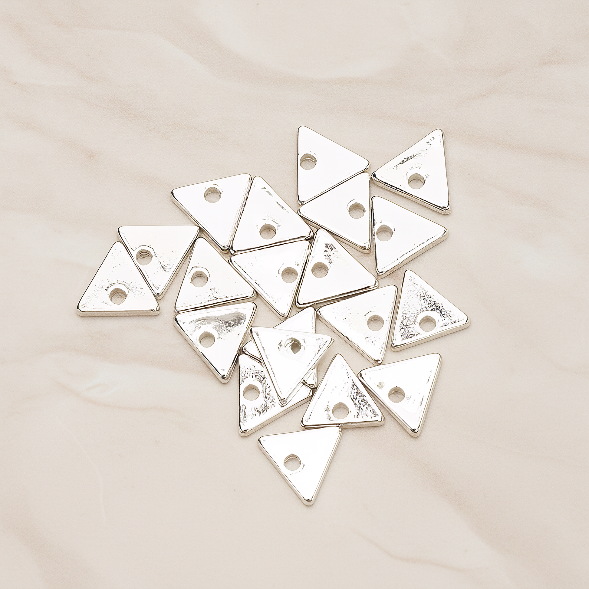 Simple Geometric 7 Mm Triangle Charm Pendant, 4 Pc on warm marble background (PD.1485)