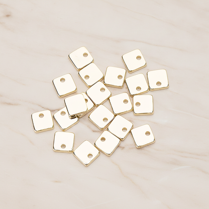 Simple Geometric 6 Mm Square Charm Pendant, 4 Pc on warm marble background (PD.1486)